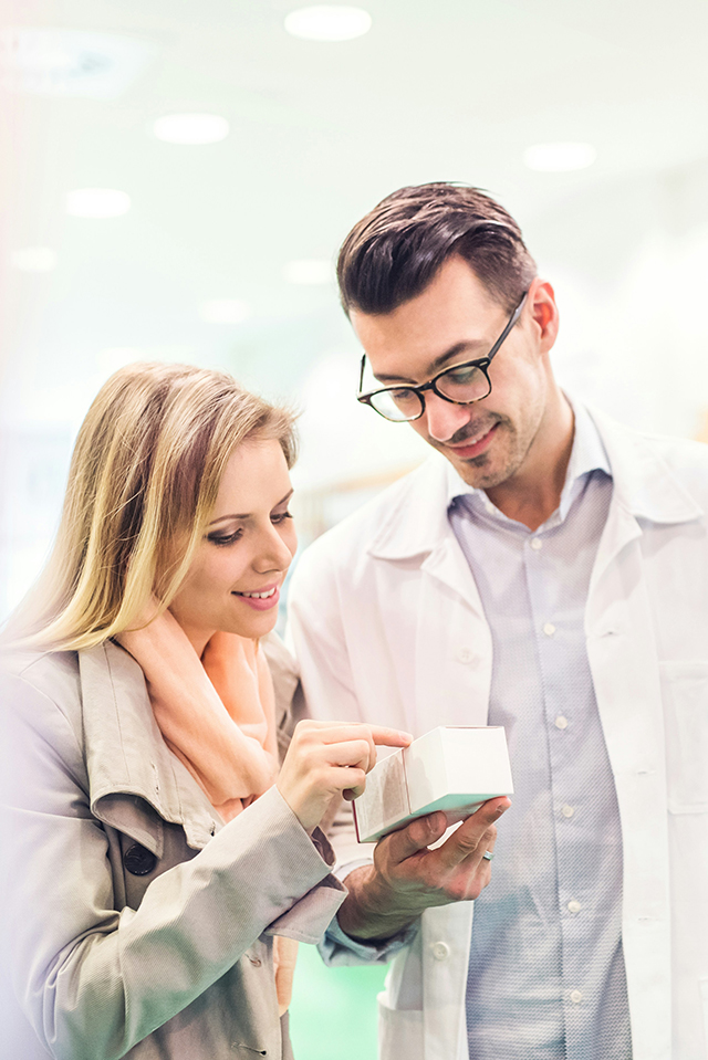 Pharmacist helping a patient